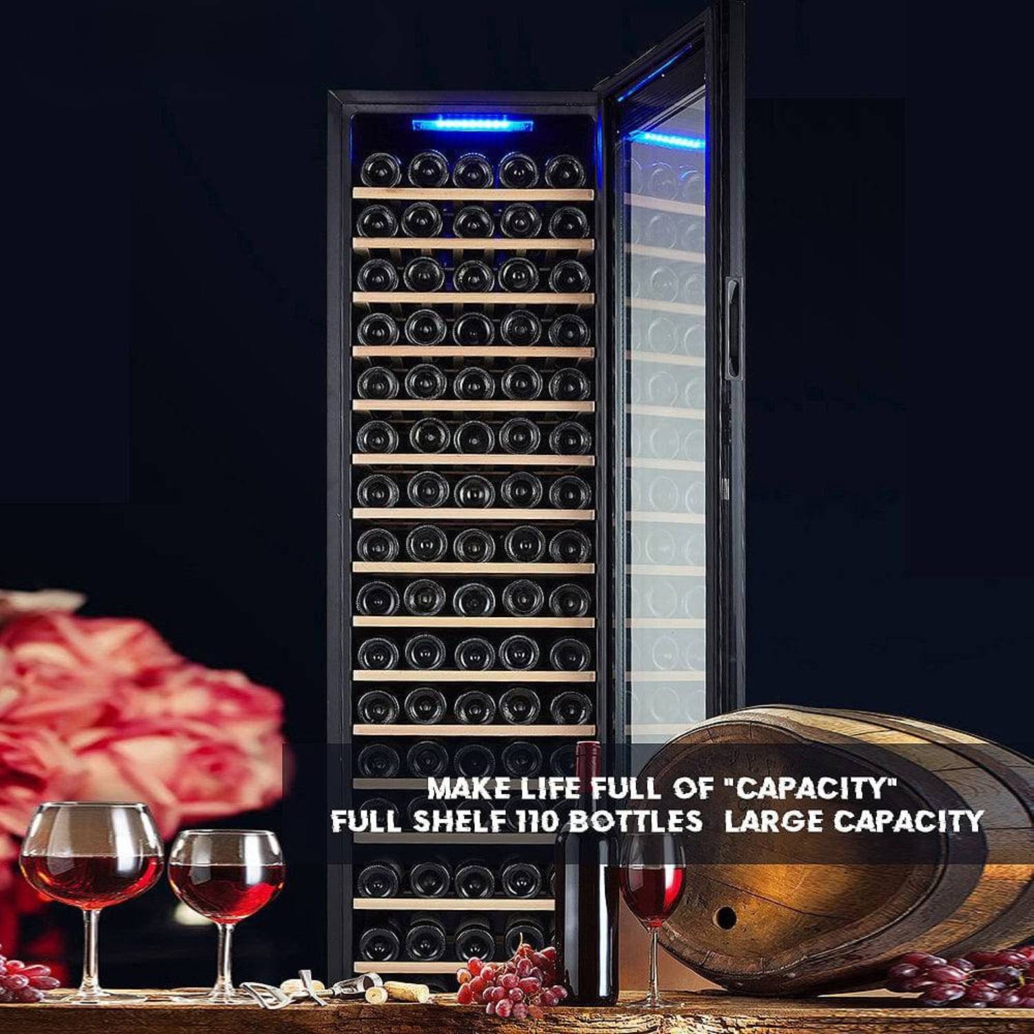 Wine cooler with wine bottles inside, surrounded by wine glasses and a barrel on a dark background.