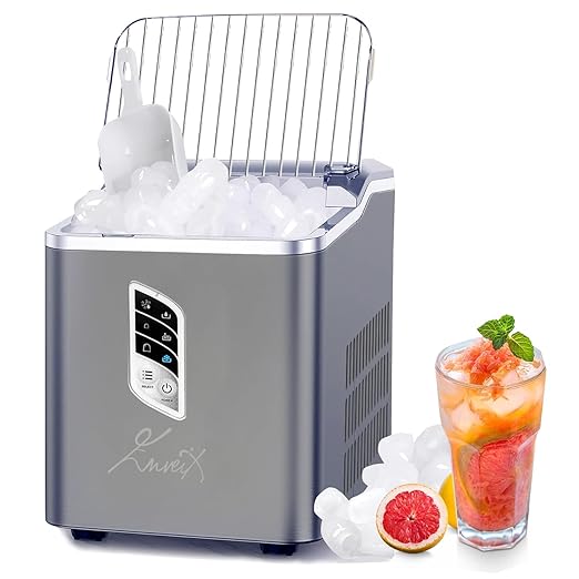 Portable ice maker with a glass of iced tea and fruit on a white background