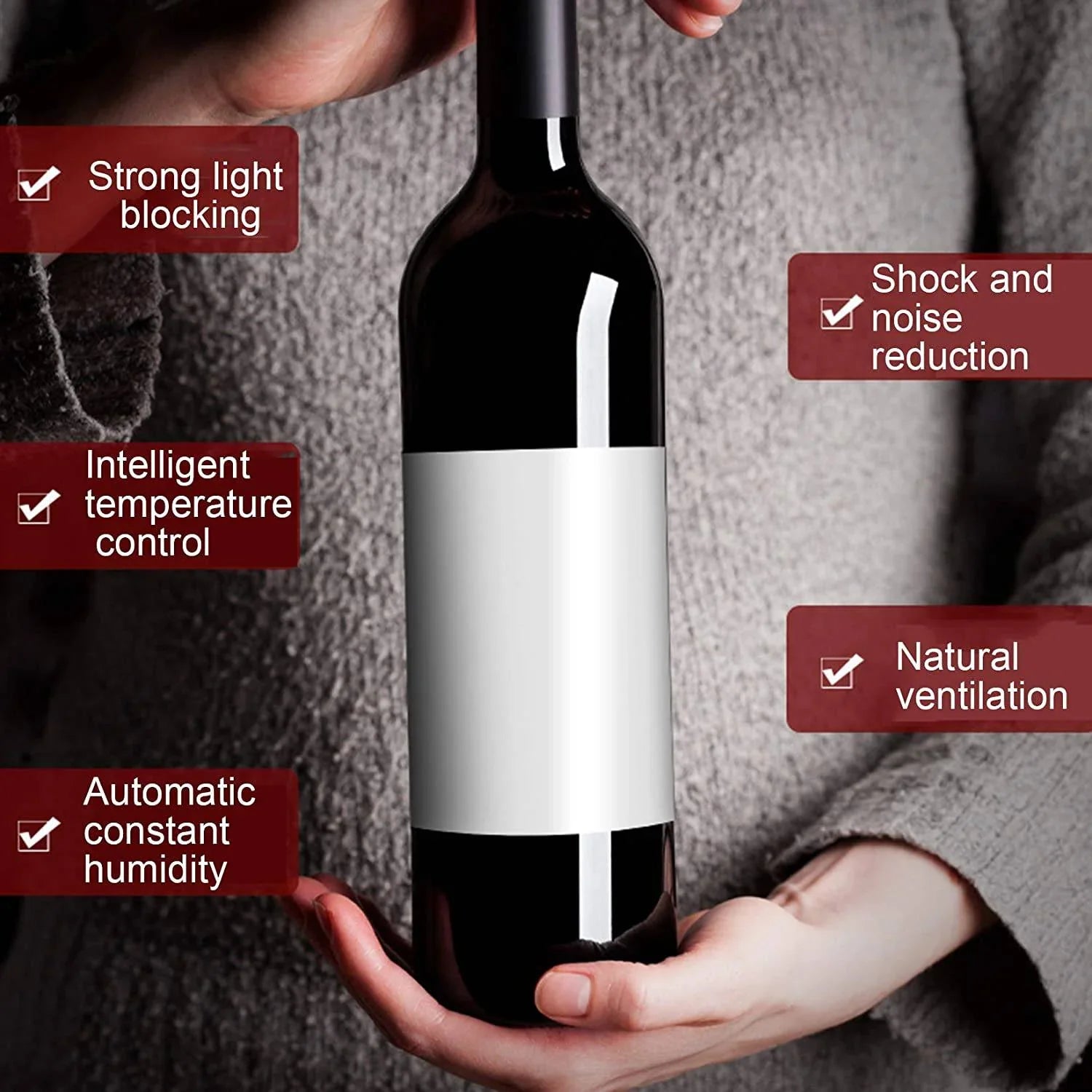 Person holding a wine bottle with features listed on the screen