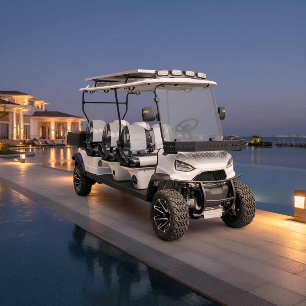 White golf cart on a patio by a pool at dusk