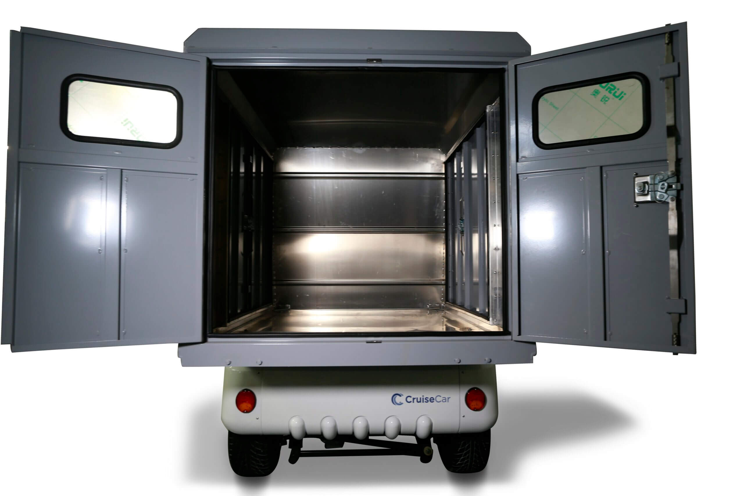 A rear view of a grey utility cart with open cargo box doors revealing an empty aluminum interior.
