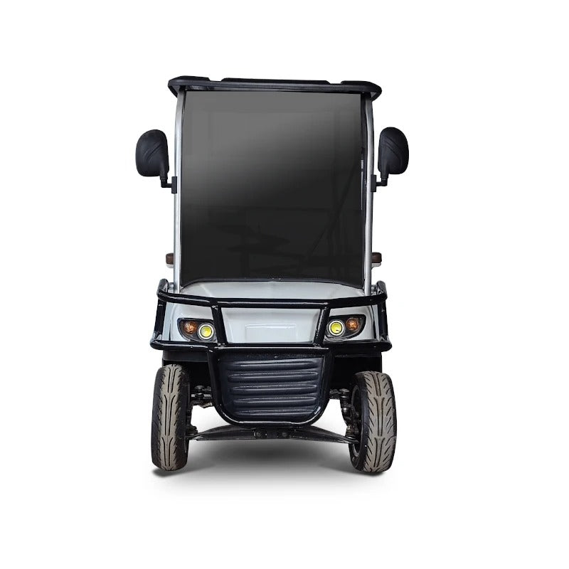 ocean cartz head-on studio shot of a white utility electric vehicle against a pure white background. This two-seater work cart highlights its robust, industrial front end, including a black front bumper or brush guard, two round headlights, and a tall, dark windshield. The image clearly displays the front vacuum tires and the compact stance of the electric golf cart.